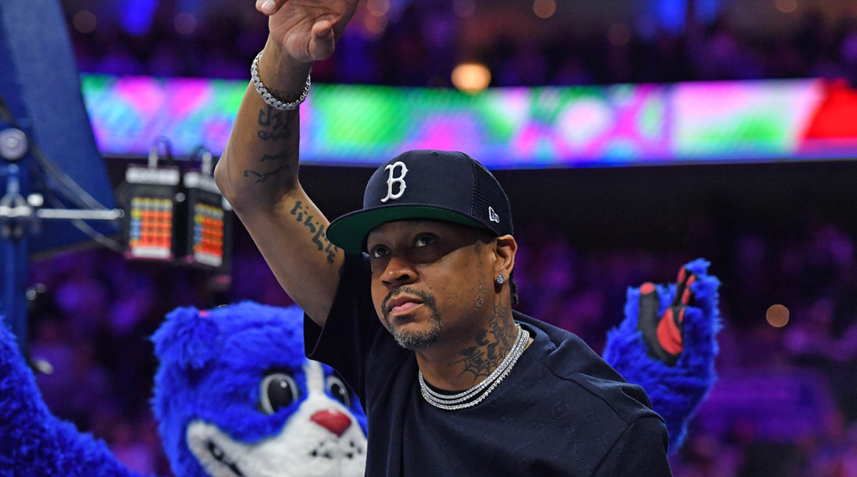 76ers player Allen Iverson acknowledges the crowd during the game against the Nets during the second quarter at Wells Fargo Center.