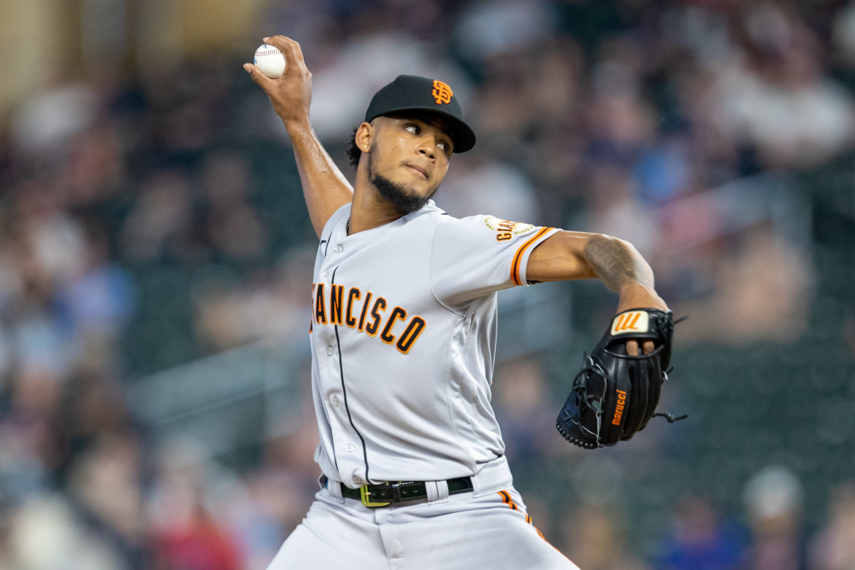 SF Giants relief pitcher Camilo Doval delivers a pitch in the ninth inning against the Minnesota Twins. (2023)