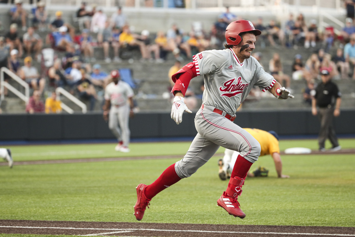 Indiana senior shortstop Phillip Glasser sprints to first base against West Virginia during the NCAA Tournament regionals at Kentucky Proud Park in Lexington, Ky. on Friday.