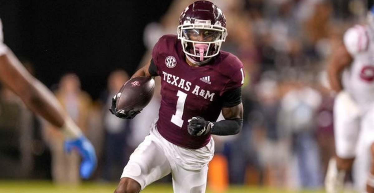 Texas A&M Aggies wide receiver Evan Stewart catches a pass during a college football game in the SEC.