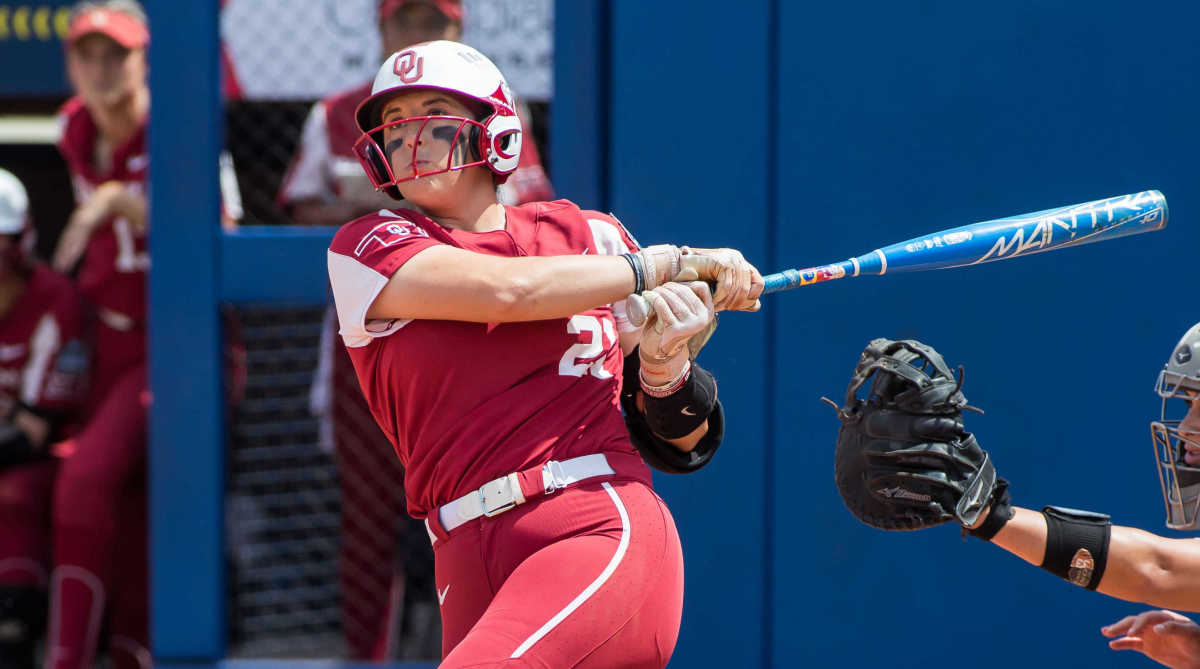 Oklahoma first baseman Grace Green makes contact on a swing