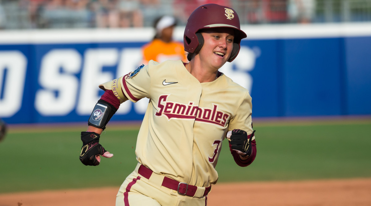 Florida State first baseman Bethaney Keen smiles as she rounds the bases after hitting a home run in the WCWS semifinals