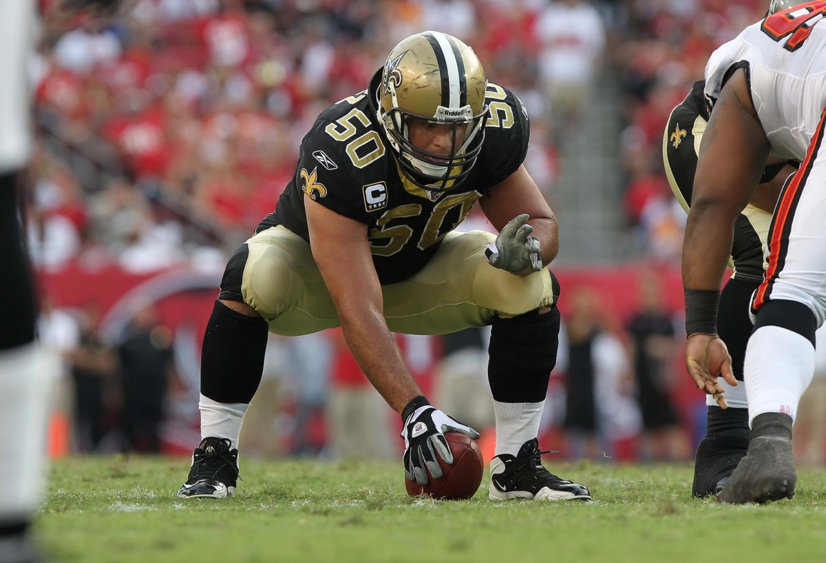 October 16, 2011; New Orleans Saints center Olin Kreutz (50) snaps the ball during the second half against the Tampa Bay Buccaneers. Mandatory Credit: Kim Klement-USA TODAY Sports
