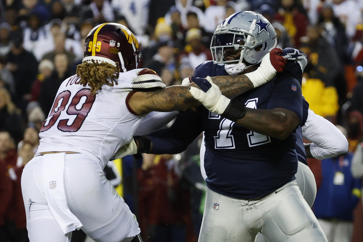 Dallas Cowboys offensive tackle Jason Peters (71) blocks Washington Commanders defensive end Chase Young