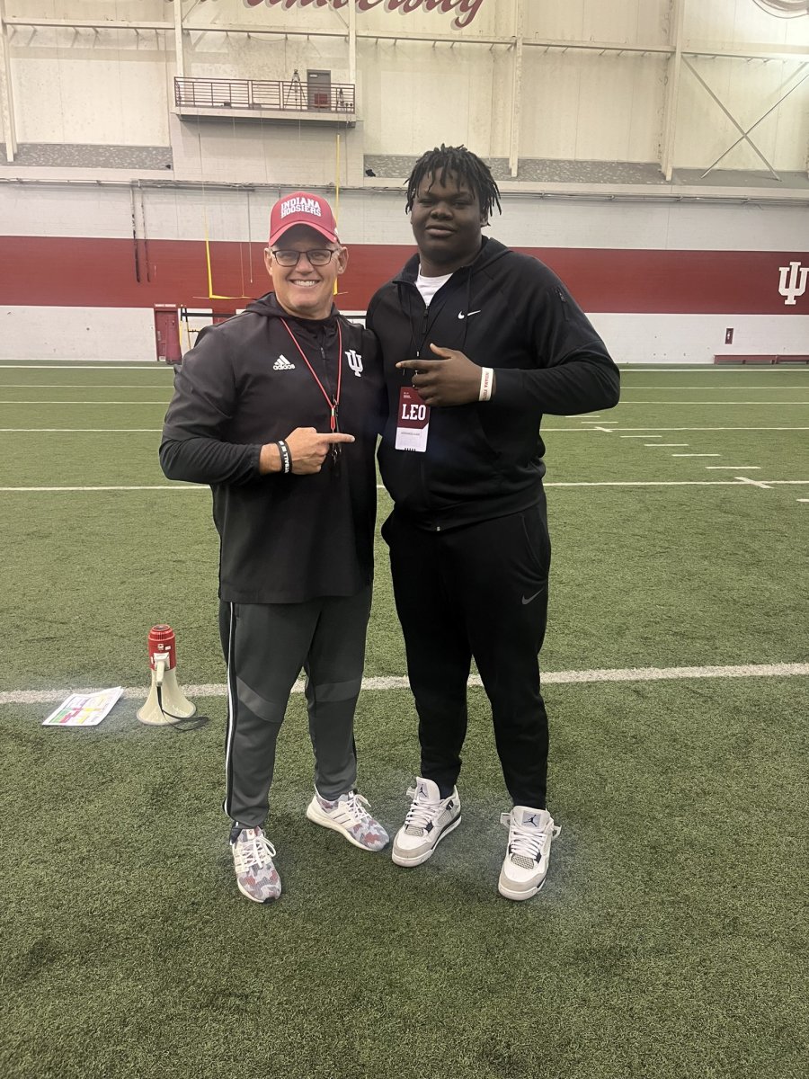 Indiana coach Tom Allen (left) and 2024 offensive lineman commit Adedamola Ajani during a visit on March 28, 2023. 