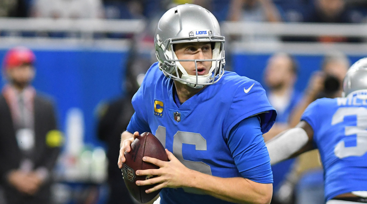Lions quarterback Jared Goff rolls out of the pocket