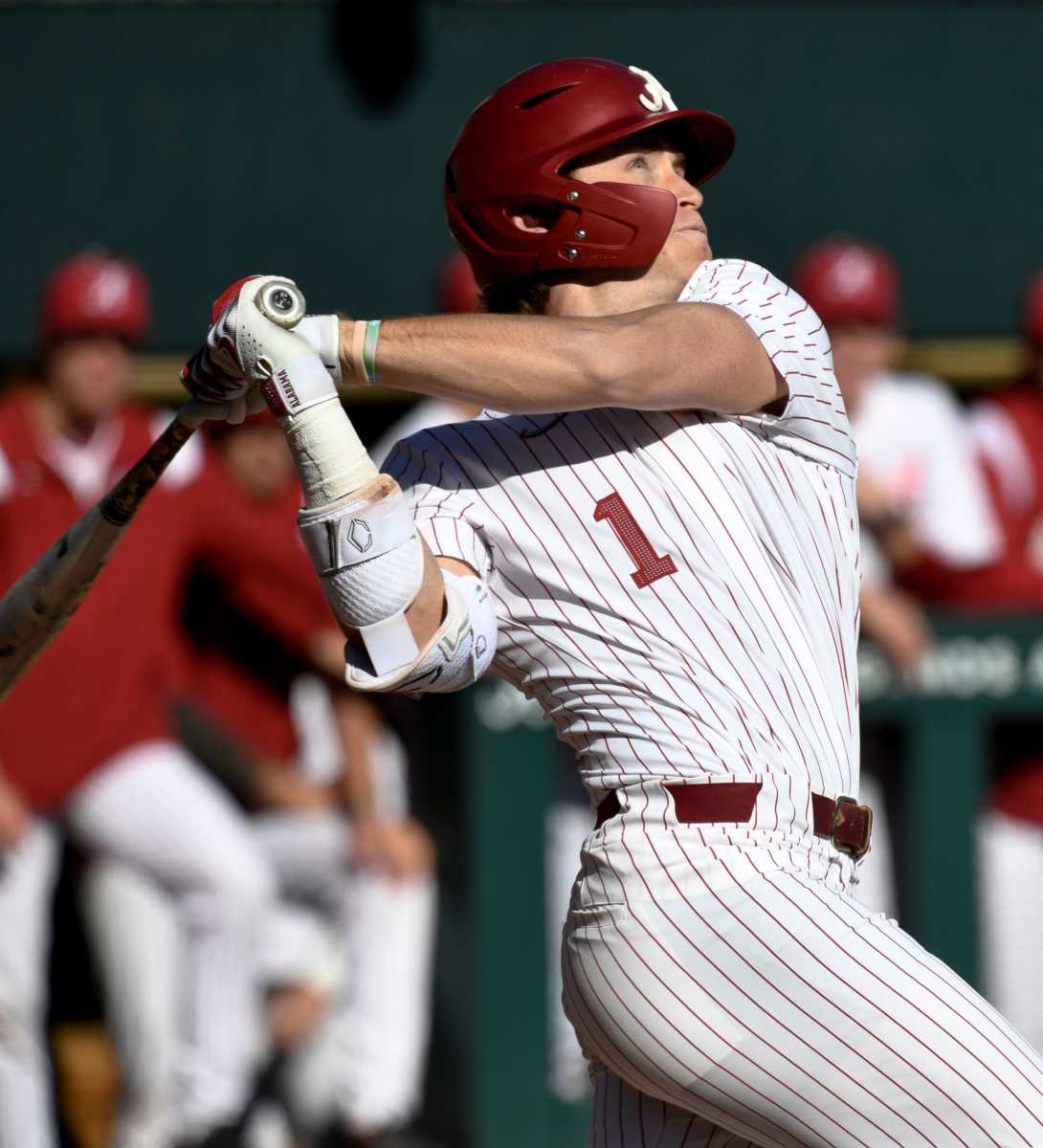 Alabama hitter Will Hodo (1) connects with a pitch. The Crimson Tide faced Richmond in the season-opening series of the 2023 baseball season.