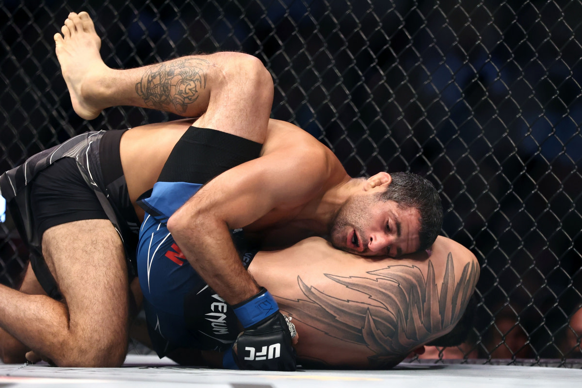 Beneil Dariush takes Tony Ferguson down during their UFC 262 bout.