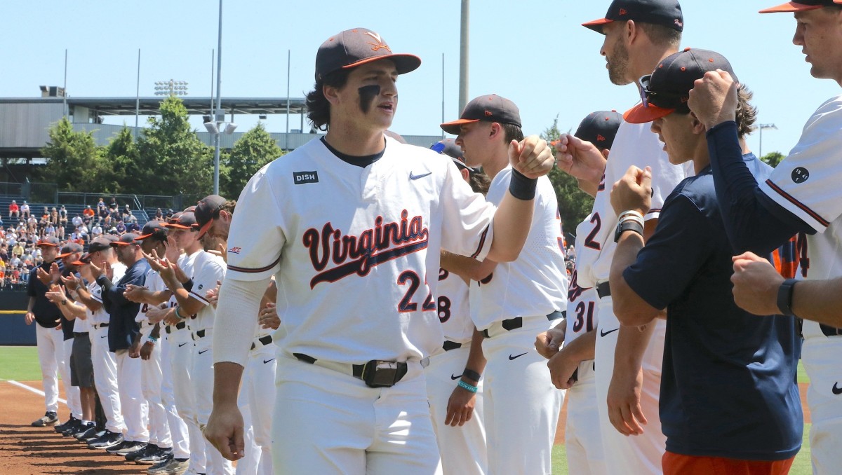 Jake Gelof greets his teammates before the Virginia baseball game against Army in the Charlottesville Regional of the NCAA Baseball Tournament at Disharoon Park.