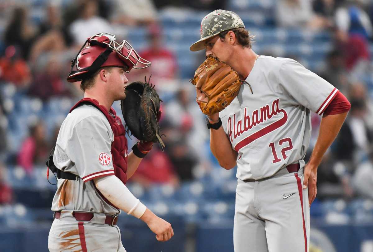 Alabama catcher Mac Guscette (9) goes to the mound to speak to Alabama pitcher Hunter Furtado (12) during a time out in the game with Kentucky during the opening round of the SEC Baseball Tournament at the Hoover Met Tuesday, May 23, 2023.