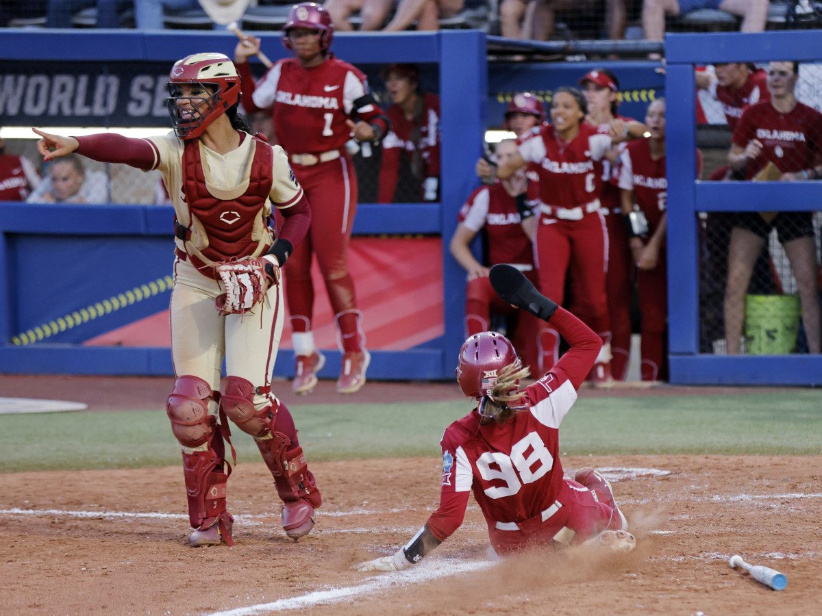 Oklahoma's Jordyn Bahl slides home to score during the sixth inning of Game 2 of the Women's College World Series.