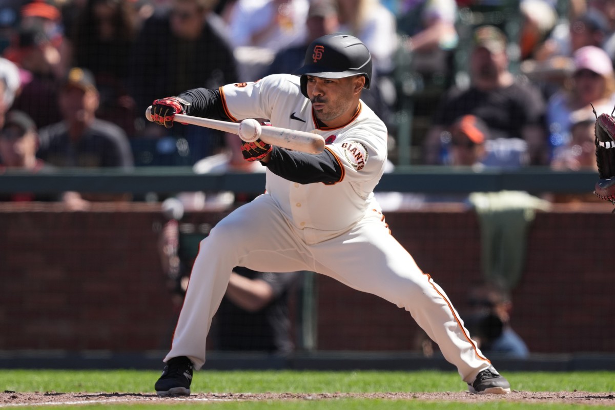 SF Giants first baseman LaMonte Wade Jr. squares up for a bunt at Oracle Park (2023).