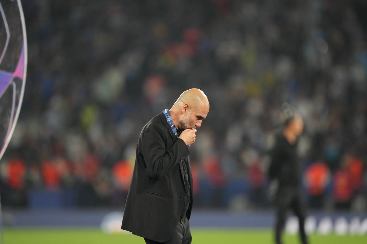 Manchester City manager Pep Guardiola pictured kissing his gold medal after his team beat Inter Milan in the 2023 UEFA Champions League final