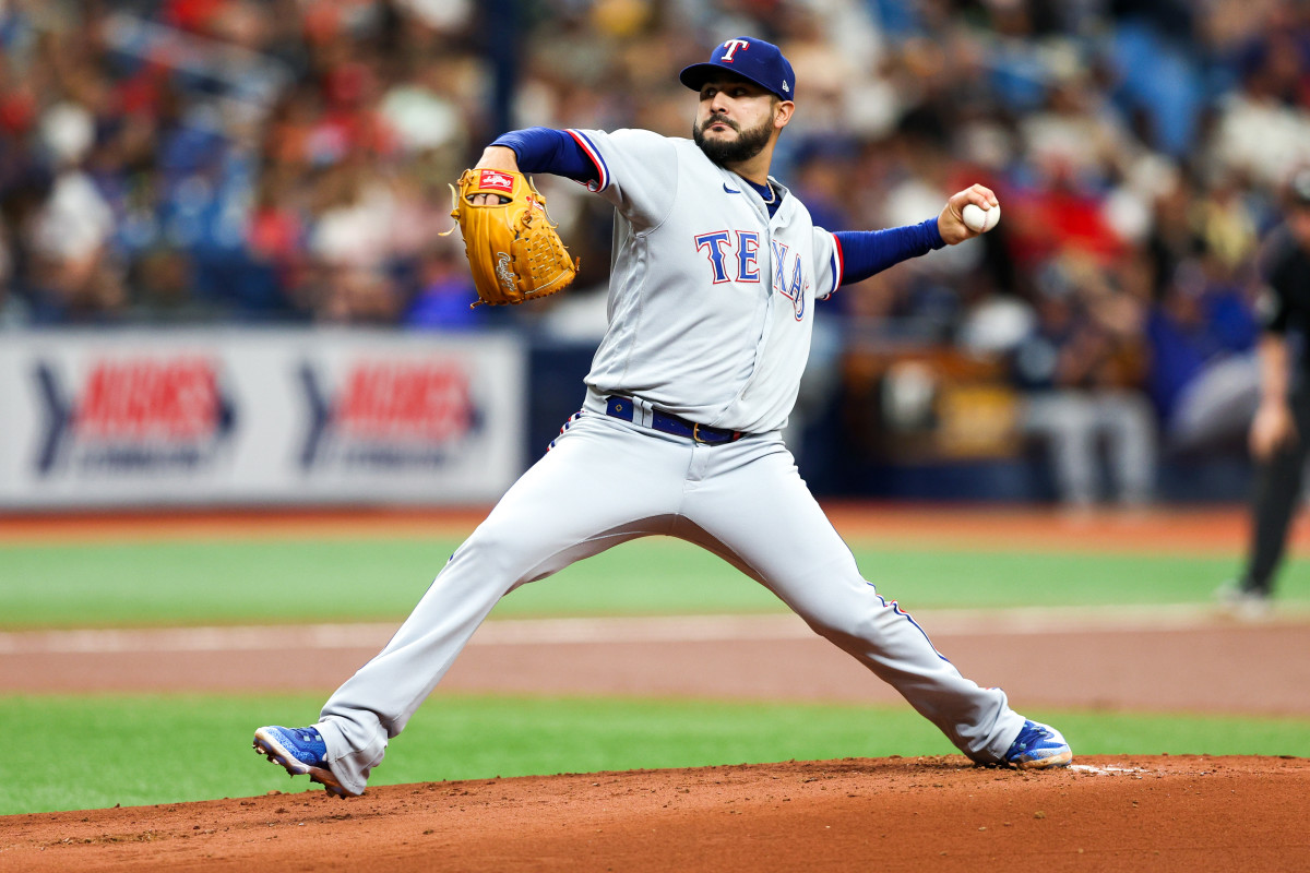 Jun 11, 2023; St. Petersburg, Florida, USA; Texas Rangers starting pitcher Martin Perez (54) throws a pitch against the Tampa Bay Rays in the first inning at Tropicana Field. Mandatory Credit: Nathan Ray Seebeck-USA TODAY Sports
