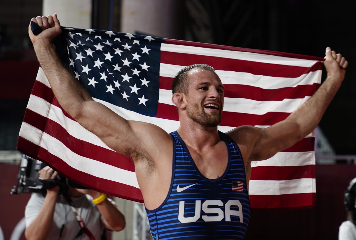 Former Penn State wrestler David Taylor celebrates winning a gold medal at the 2020 Summer Olympics in Tokyo.