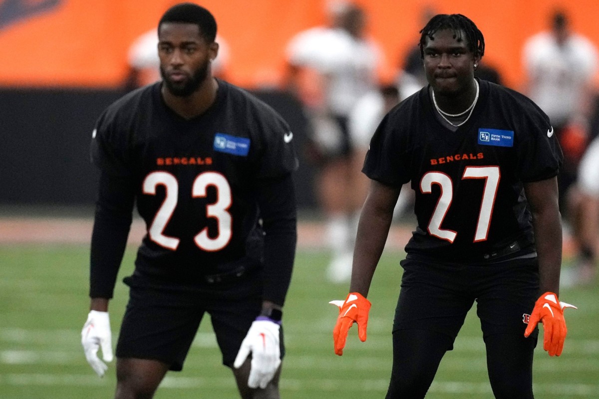 Cincinnati Bengals defensive backs Dax Hill and Jordan Battle participate in drills during the team s practice, Tuesday, May 16, 2023, inside the team s indoor practice facility in Cincinnati.