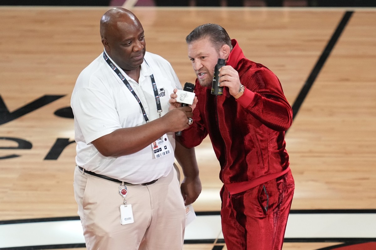 UFC mega star Conor McGregor at game four of the NBA Finals promoting a pain relief spray.
