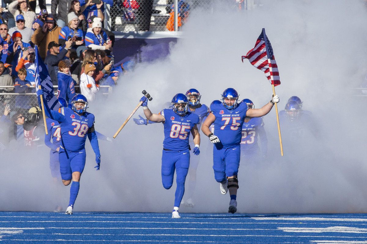 Dec 3, 2022; Boise, Idaho, USA; Boise State Broncos tight end Matt Lauter (85) leads the team onto the field prior to the first half of the Mountain West Championship game Fresno State Bulldogs versus the Boise State Broncos at Albertsons Stadium. Mandatory Credit: Brian Losness-USA TODAY Sport