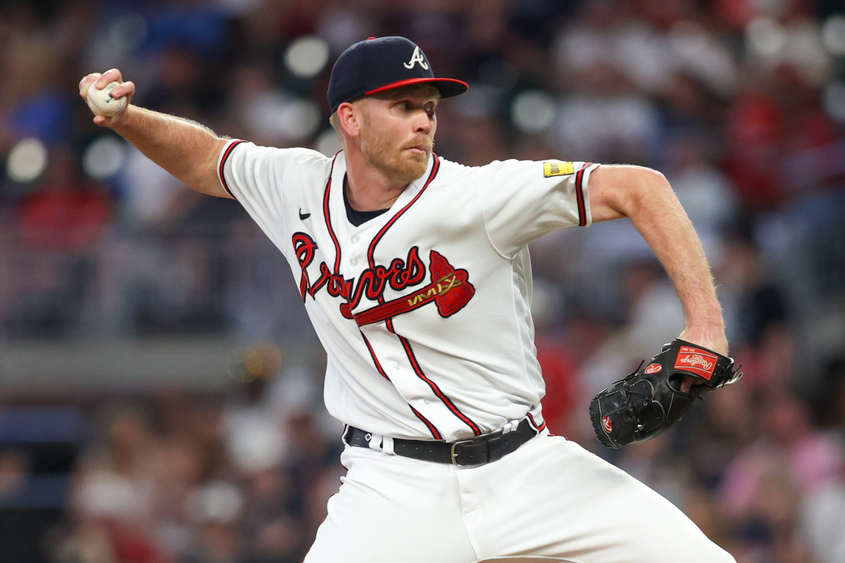 Jun 15, 2023; Atlanta, Georgia, USA; Atlanta Braves relief pitcher Michael Tonkin (51) throws against the Colorado Rockies in the sixth inning at Truist Park.