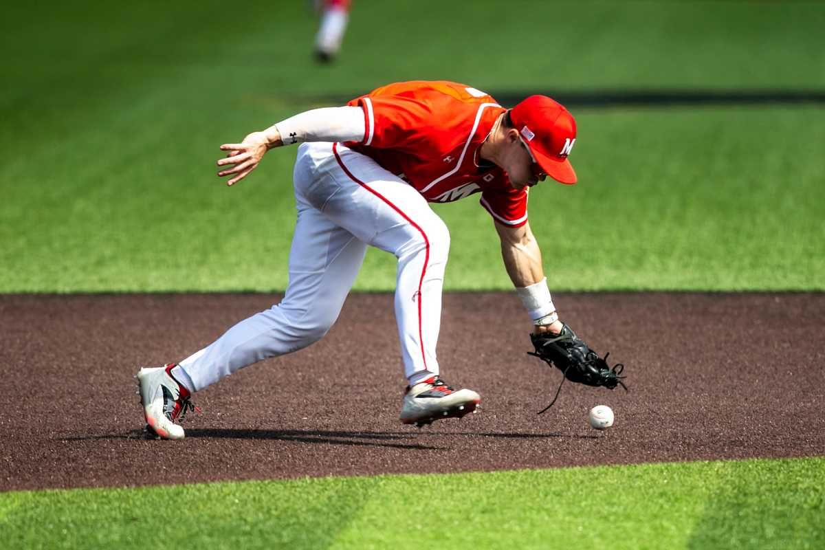 Maryland's Matt Shaw attempts to field a ball during a NCAA Big Ten Conference baseball game against Iowa. (2023)