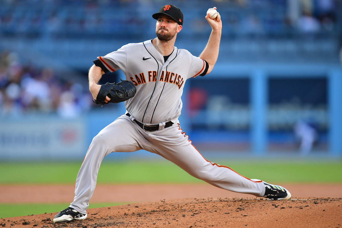 SF Giants starting pitcher Alex Wood throws against the Los Angeles Dodgers during the second inning at Dodger Stadium on June 17, 2023.