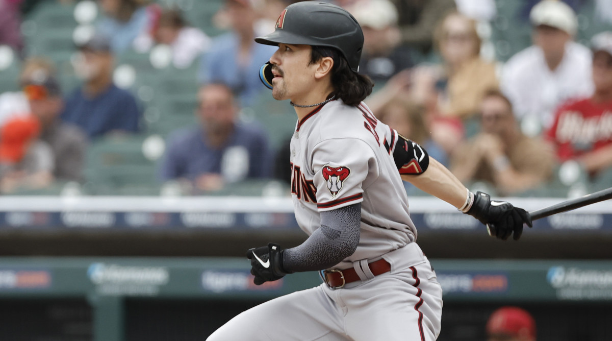 Arizona Diamondbacks left fielder Corbin Carroll looks on as he hits a triple against the Detroit Tigers.