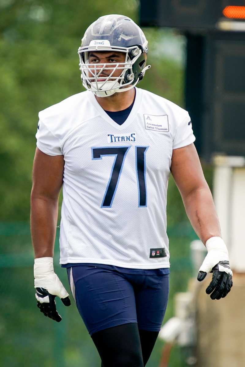 Andre Dillard stands with his helmet on at Titans’ OTAs
