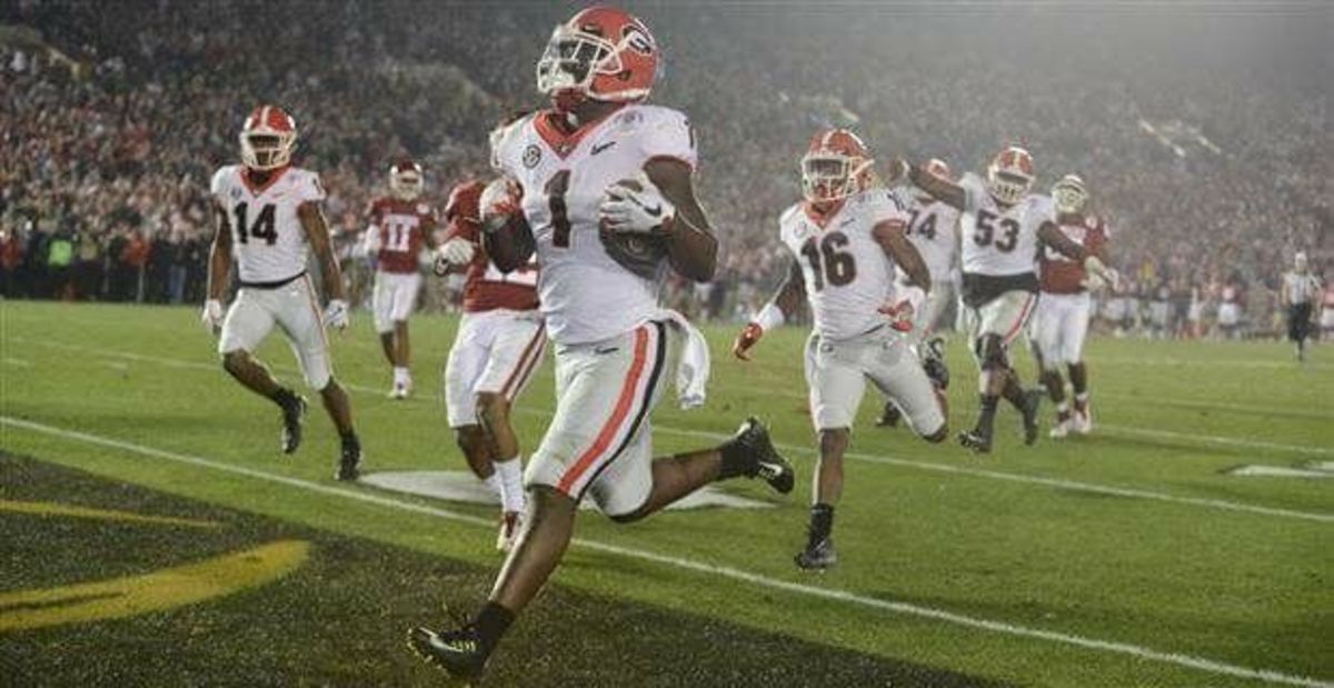 Running back Sony Michel (1) crosses the goal line to score the decisive touchdown for Georgia in the 2018 Rose Bowl to send the Bulldogs in the CFP National Championship Game. 