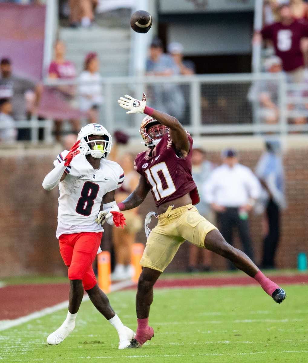 Florida State defensive back Jammie Robinson (10) leaps in front of his opponent to try to intercept the ball. The Florida State Seminoles hosted the Duquesne Dukes at Doak Campbell Stadium on Saturday, Aug. 27, 2022. | Alicia Devine/Tallahassee Democrat / USA TODAY NETWORK