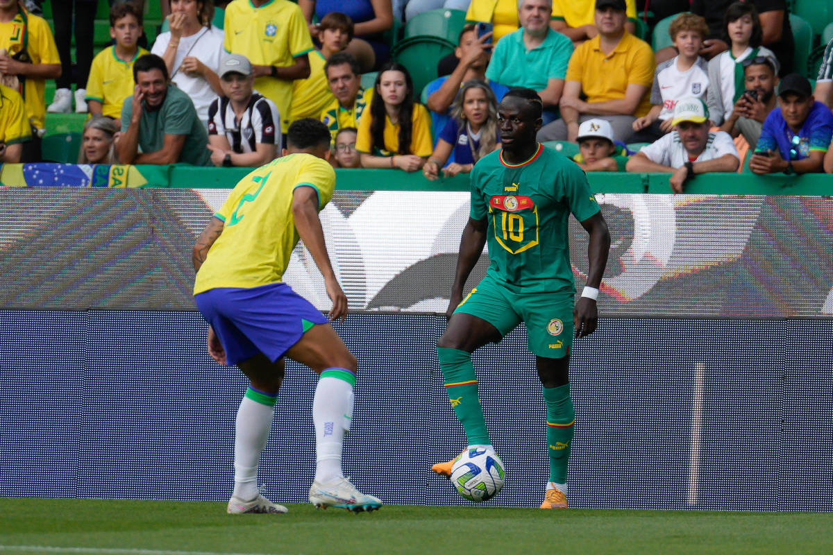 Sadio Mane pictured (right) in action for Senegal during a 4-2 win over Brazil in Lisbon in June 2023