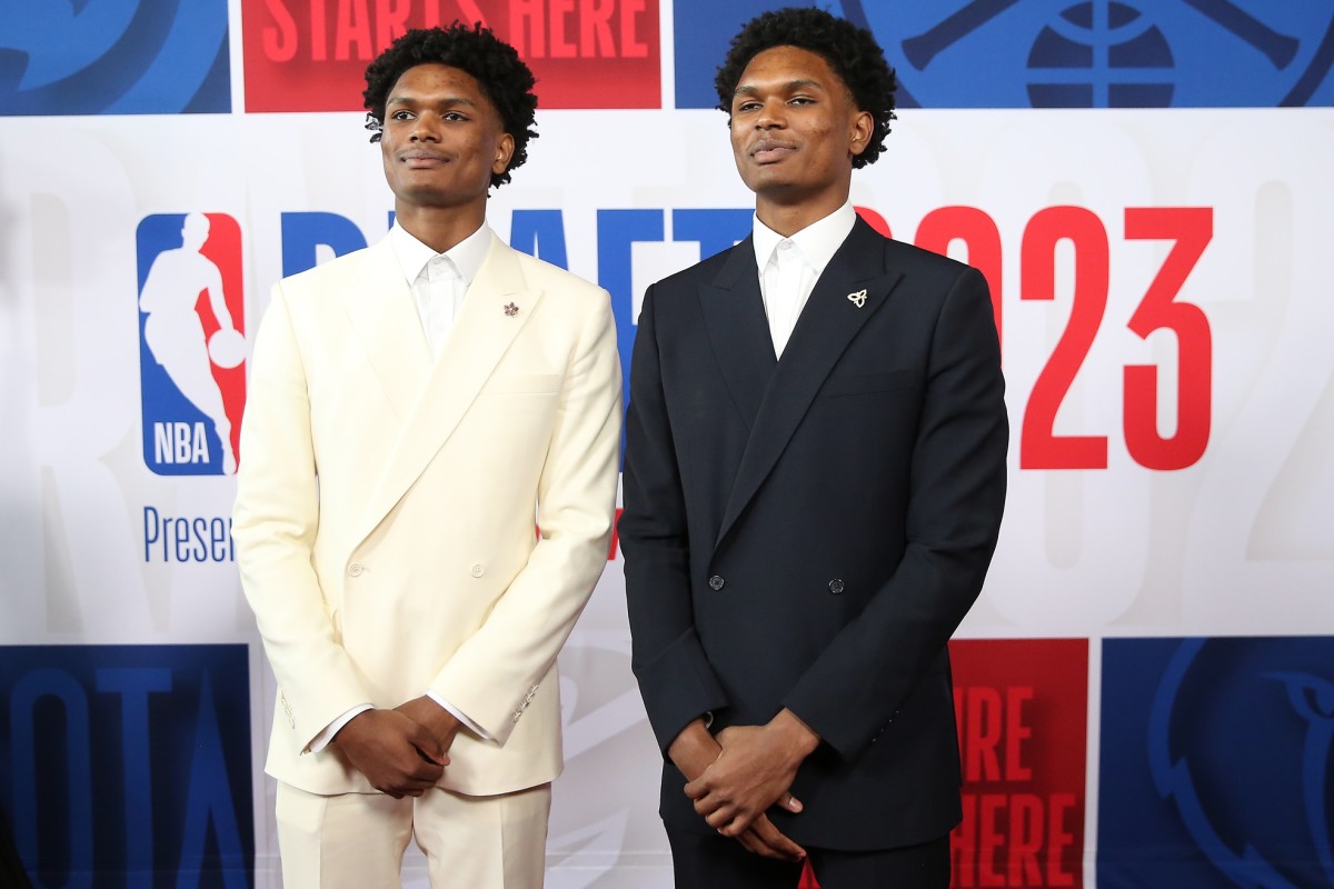 Amen Thompson (L) and Ausar Thompson (R) arrive for the first round of the 2023 NBA Draft at Barclays Arena.