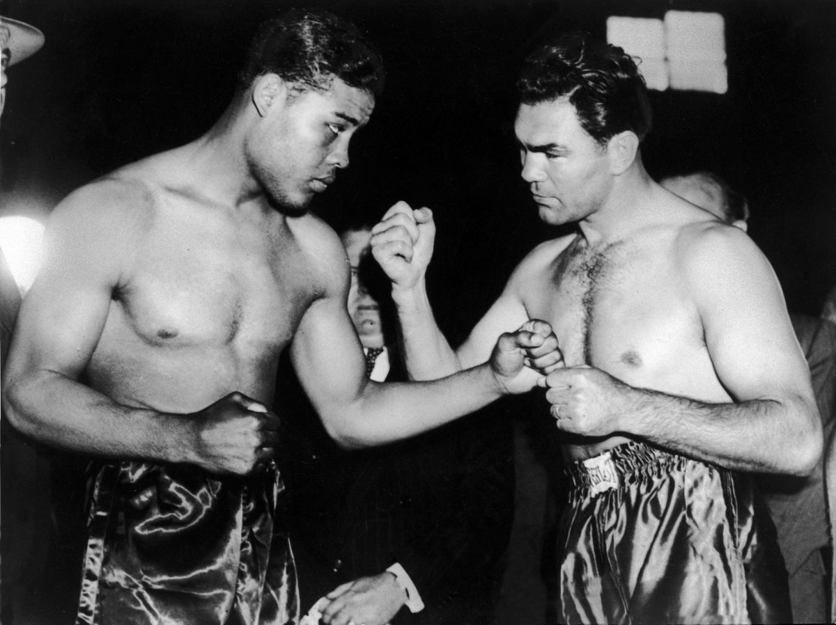 Joe Louis and Max Schmeling face off before their historic 1938 bout.