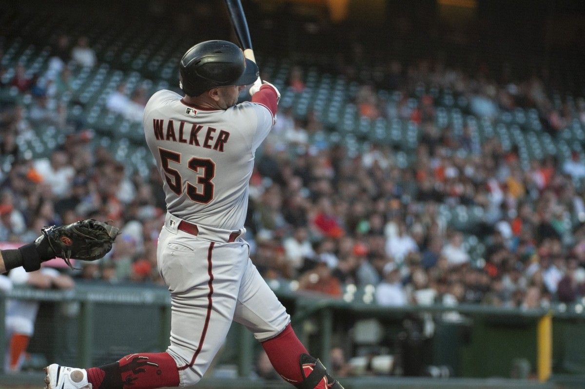 Diamondbacks first baseman Christian Walker (53) hits a solo home run against the San Francisco Giants at Oracle Park.