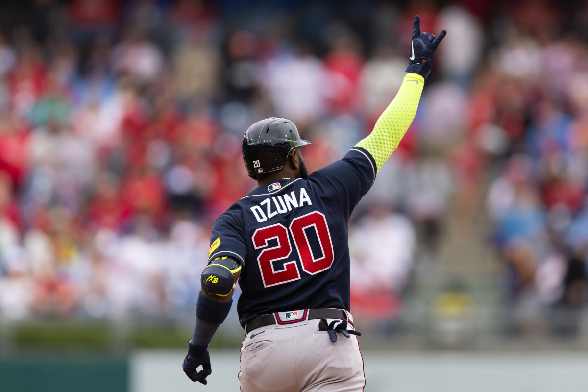 Jun 22, 2023; Philadelphia, Pennsylvania, USA; Atlanta Braves designated hitter Marcell Ozuna (20) reacts to his two RBI home run during the tenth inning against the Philadelphia Phillies at Citizens Bank Park. Mandatory Credit: Bill Streicher-USA TODAY Sports