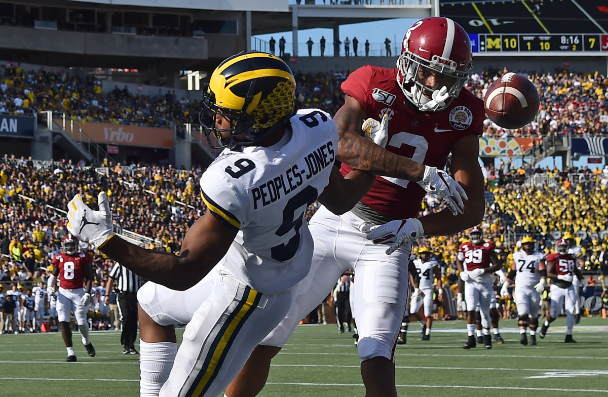 Alabama Crimson Tide defensive back Patrick Surtain II (2) breaks up the pass intended for Michigan Wolverines wide receiver Donovan Peoples-Jones (9) during the first half at Camping World Stadium.