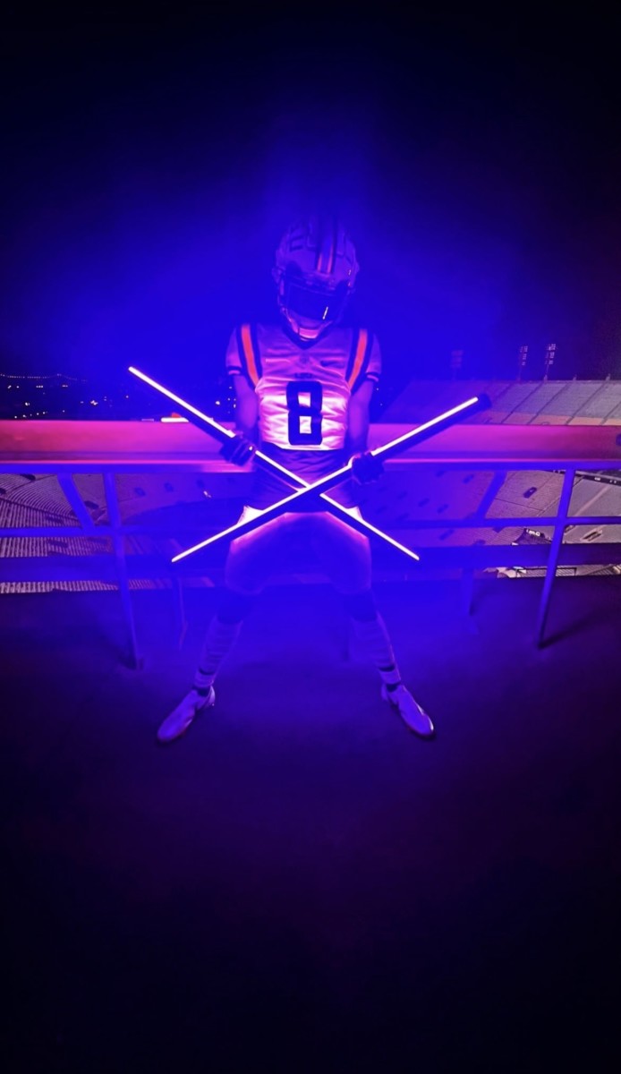 Cai Bates poses in Tiger Stadium for a photoshoot on his official visit to LSU over the weekend, per Bates' Instagram. 