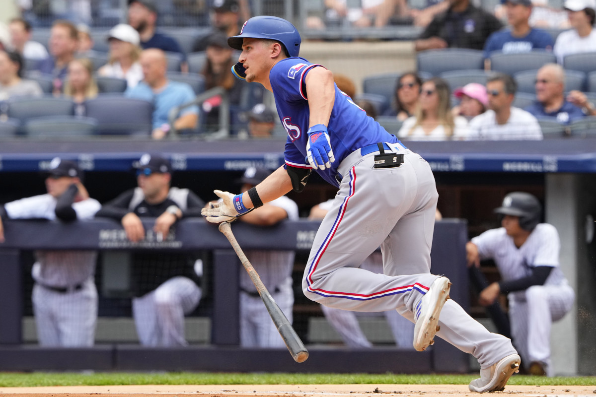 Jun 25, 2023; Bronx, New York, USA; Texas Rangers shortstop Corey Seager (5) runs out an RBI single against the New York Yankees during the first inning at Yankee Stadium. Mandatory Credit: Gregory Fisher-USA TODAY Sports