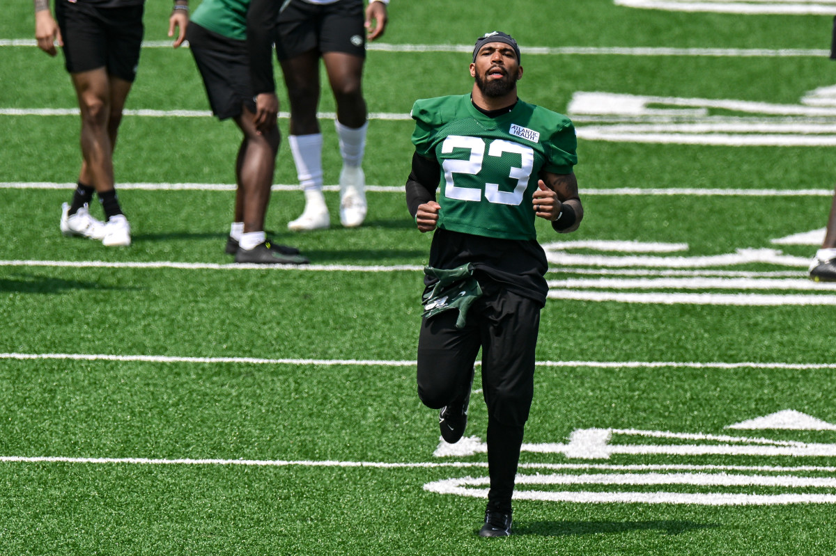 New York Jets safety Chuck Clark jogs at OTAs