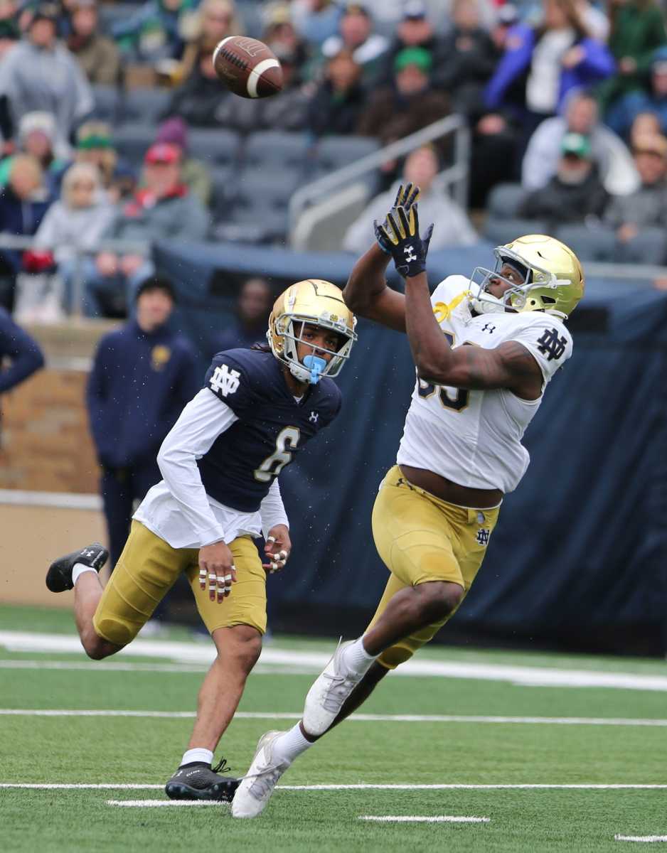 Notre Dame wide receiver Jayden Thomas (83) hauls in a pass in front of cornerback Clarence Lewis (6) during the Notre Dame Blue-Gold Spring Football game on Saturday, April 22, 2023, at Notre Dame Stadium in South Bend. ND Football Blue Gold Game