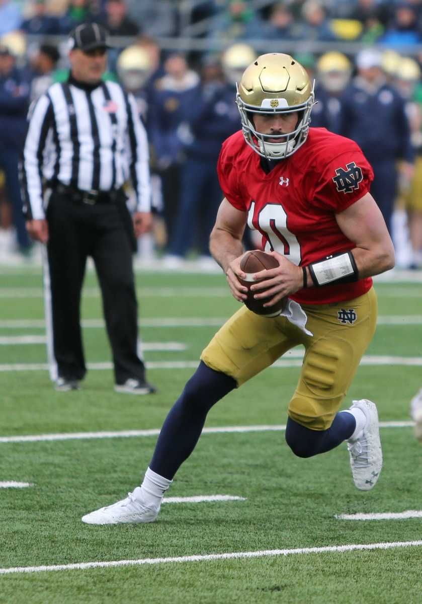Notre Dame quarterback Sam Hartman (10) runs during the Notre Dame Blue-Gold Spring Football game on Saturday, April 22, 2023, at Notre Dame Stadium in South Bend. Nd Blue Gold Game 042