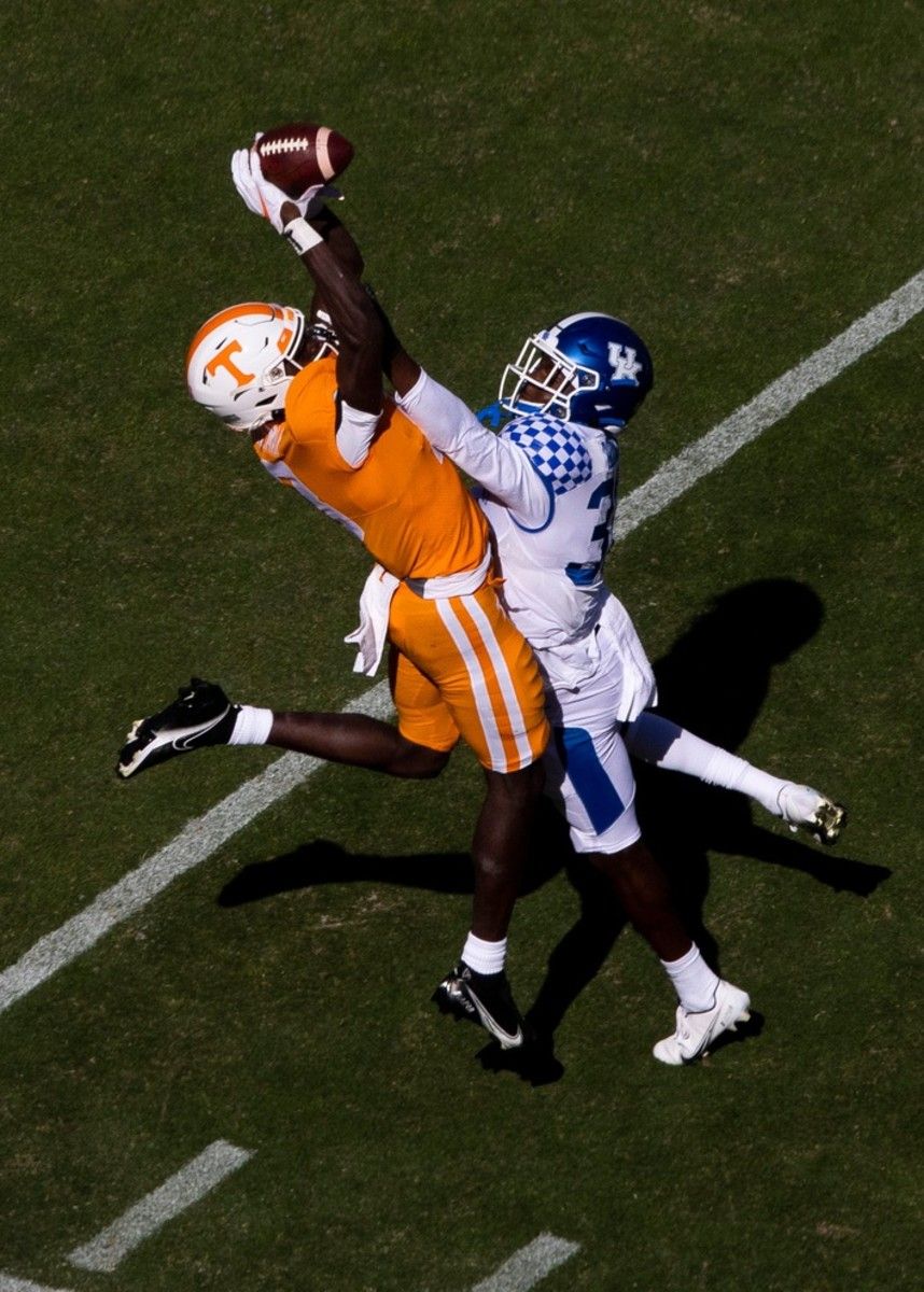 Tennessee wide receiver Malachi Wideman (13) pulls in a pass over Kentucky defensive back Jamari Brown (32) during a SEC conference football game between the Tennessee Volunteers and the Kentucky Wildcats held at Neyland Stadium in Knoxville, Tenn., on Saturday, October 17, 2020. Kns Ut Football Kentucky Bp