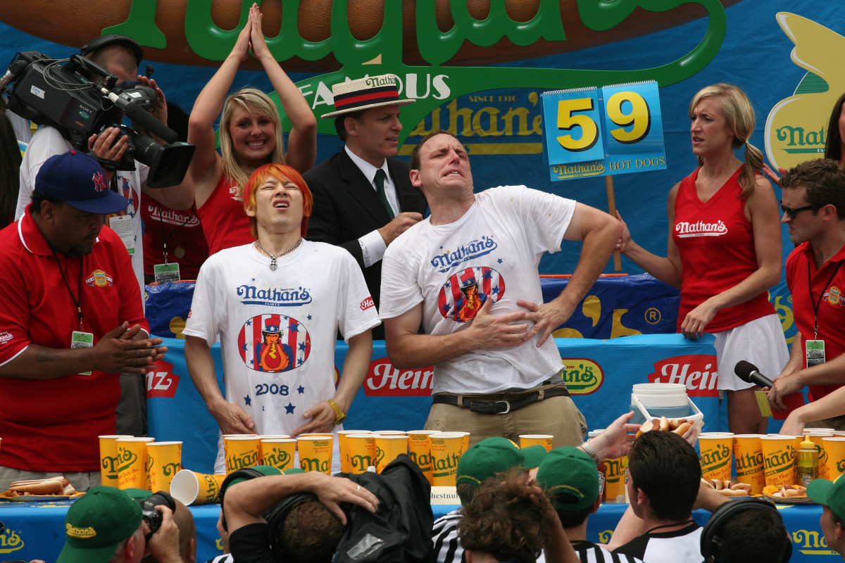 Kobayashi and Chestnut needed sudden death overtime to settle the 2008 Nathan's Famous Fourth of July hot dog eating contest.  Chestnut prevailed, eating a total of 59 dogs.