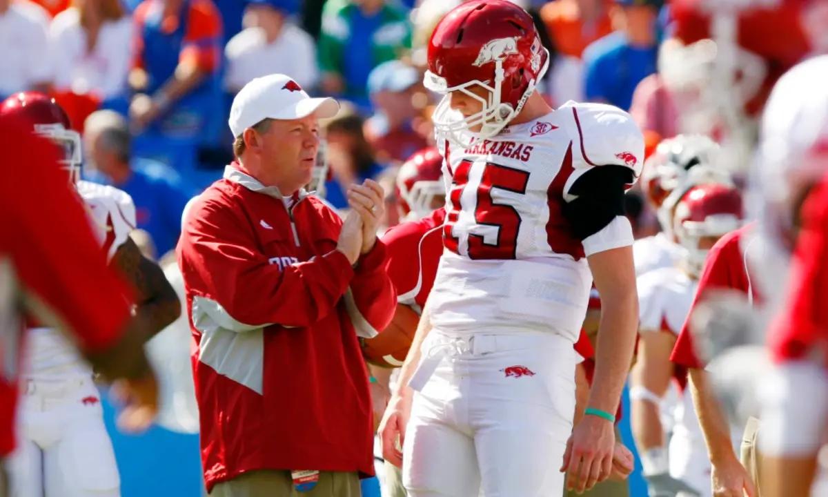 Texas A&M Aggies offensive coordinator Bobby Petrino (left) was the Arkansas Razorbacks head coach from 2008-11.