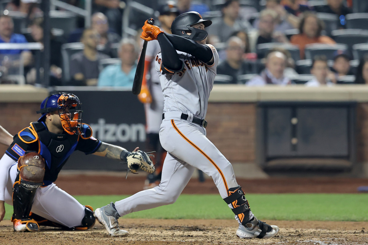 SF Giants catcher Patrick Bailey follows through on a three run home run against the New York Mets during the eighth inning at Citi Field on June 30, 2023.