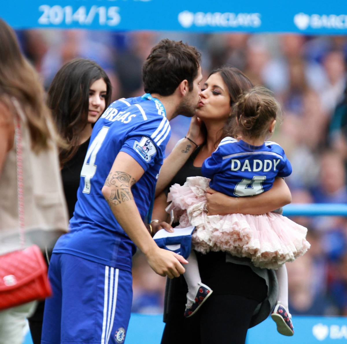 Cesc Fabregas pictured kissing wife Daniella Semaan after winning the Premier League with Chelsea in 2015