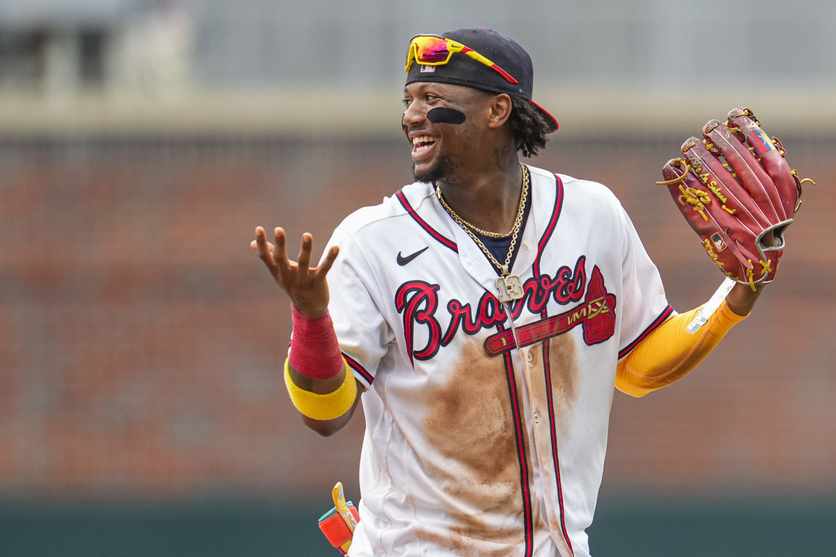 Jul 2, 2023; Cumberland, Georgia, USA; Atlanta Braves right fielder Ronald Acuna Jr. (13) reacts after the Braves defeated the Miami Marlins at Truist Park.