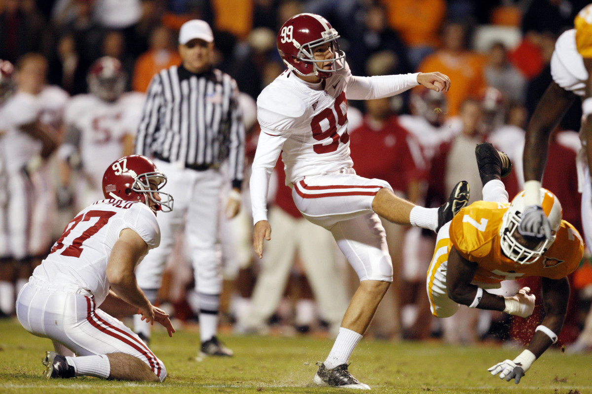 Alabama Crimson Tide kicker Leigh Tiffin (99) watches the flight of the ball after kicking a field goal against the Tennessee Volunteers in the second half at Neyland Stadium. Alabama defeated Tennessee 29-9.
