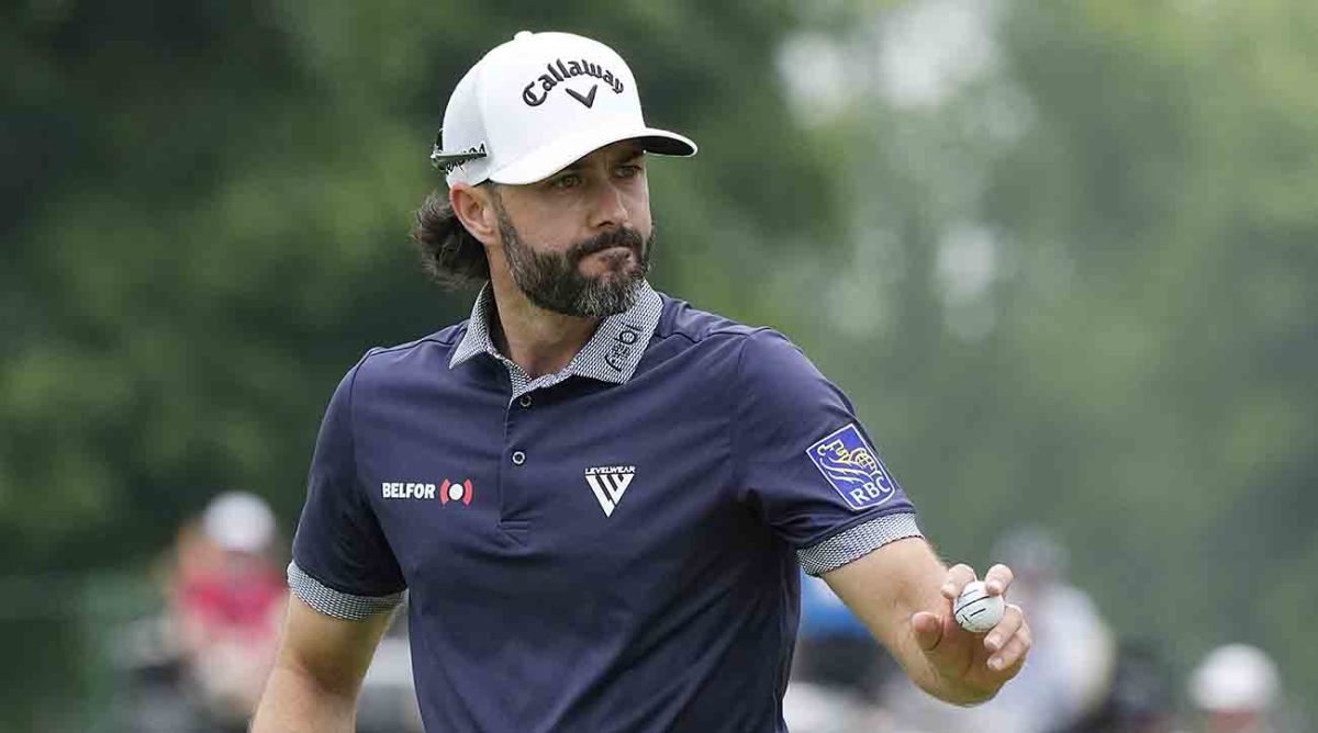 Adam Hadwin acknowledges the crowd during the 2023 Rocket Mortgage Classic.