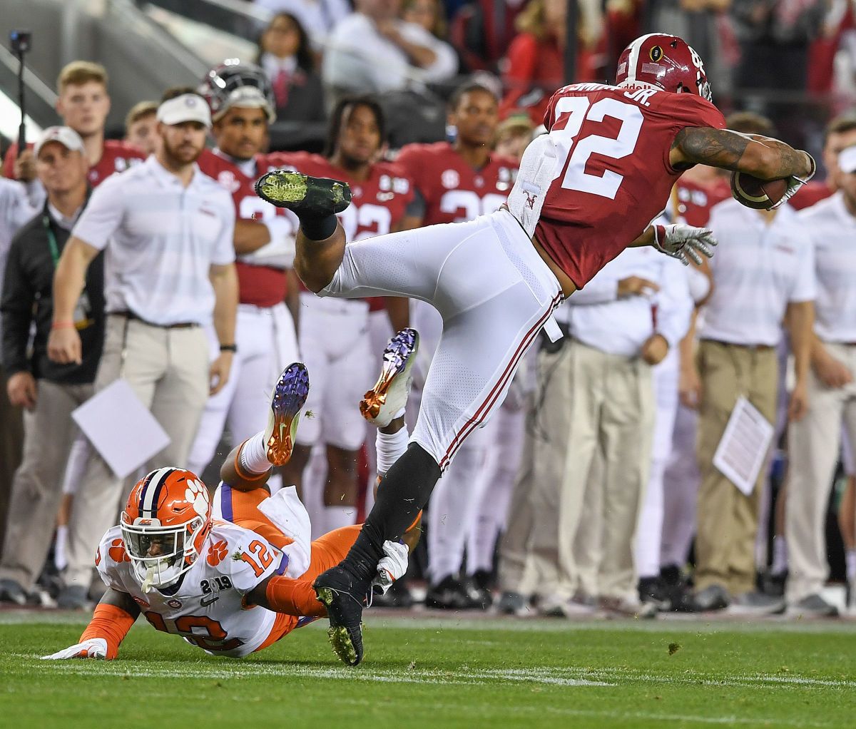 Clemson defensive back K'Von Wallace (12) brings down Alabama tight end Irv Smith Jr. (82) during the first quarter of the College Football National Championship at Levi's Stadium in Santa Clara, Calif., on January 7, 2019.