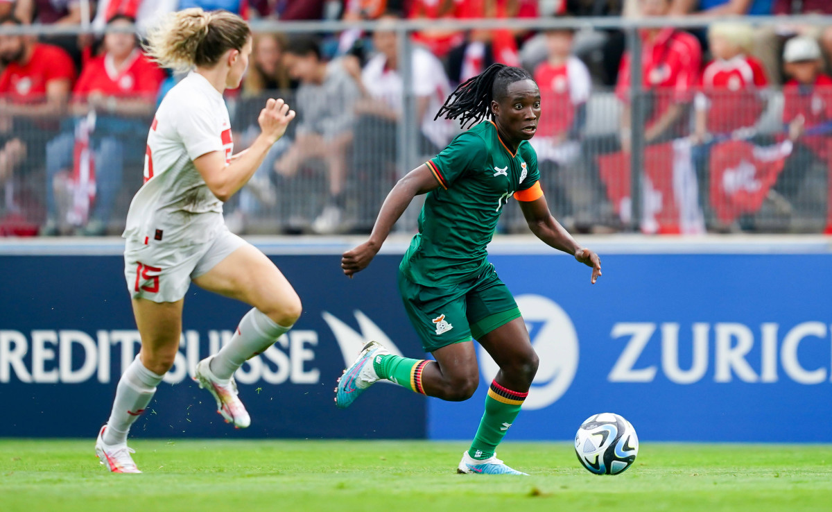 Zambia's Barbra Banda battles for the ball against Switzerland.